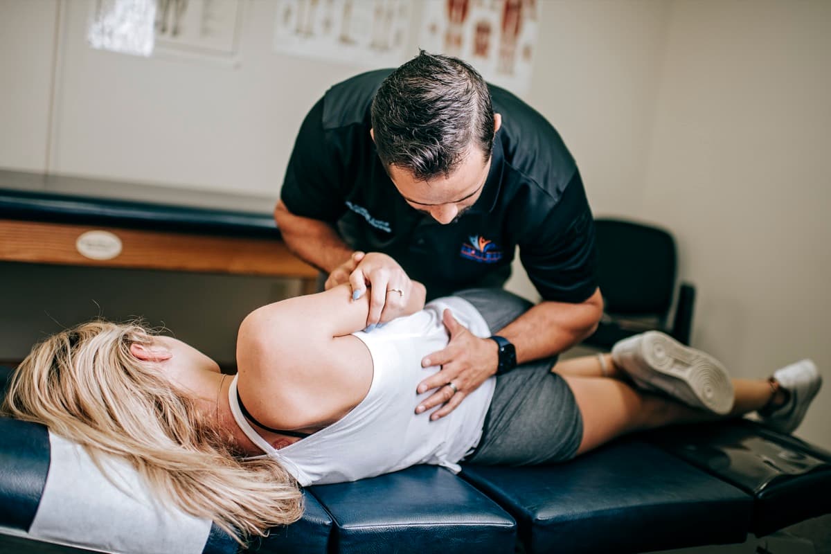 Why Your Back Seizes Up After Yard Work (And When to Come In)